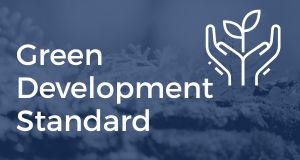 The text "Green Development Standard" with an icon of a plant growing from hands.